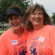 two smiling women at the 5K